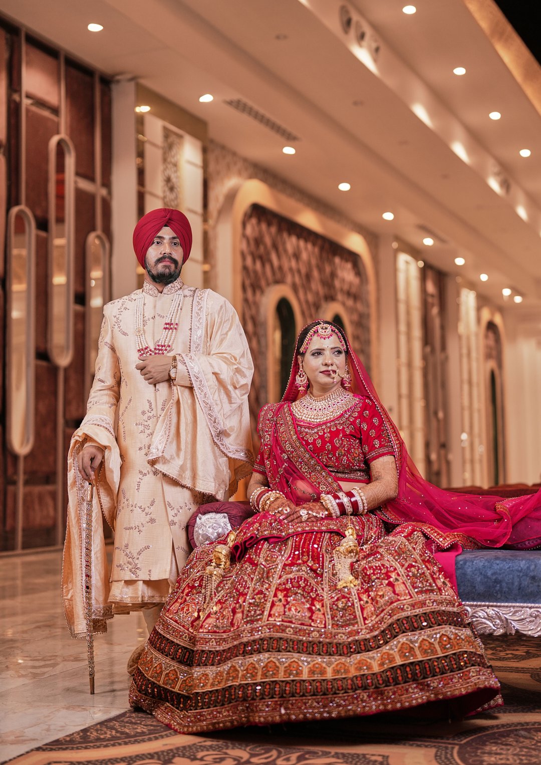 Emotional candid moment during sacred Punjabi wedding rituals, captured with cinematic lighting