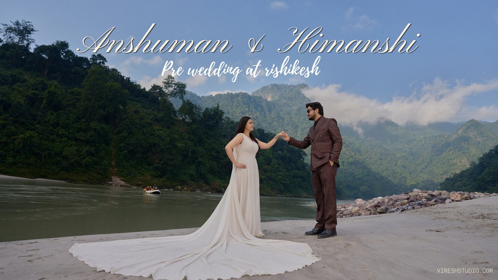 Couple posing in front of a scenic waterfall in Rishikesh during pre-wedding shoot